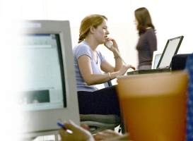 woman on phone from business voIp providers